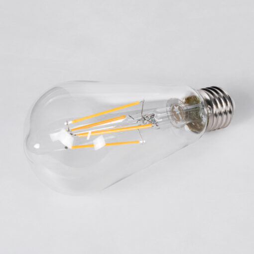 GloboStar® 99017 Λάμπα LED Long Filament E27 ST64 Αχλάδι 10W 1000lm 360° AC 220-240V IP20 Φ6.4 x Υ14cm Θερμό Λευκό 2700K με Διάφανο Γυαλί – Dimmable – 3 Years Warranty