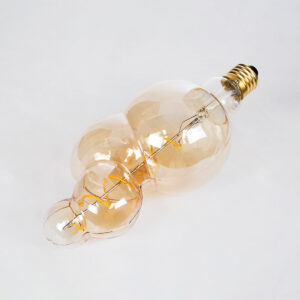 GloboStar® 99021 Λάμπα LED Soft S Spiral Filament E27 BB100 BUBBLES Γλόμπος 6W 420lm 360° AC 220-240V IP20 Φ10 x Υ24cm Ultra Θερμό Λευκό 2200K με Μελί Γυαλί – Dimmable – 3 Years Warranty