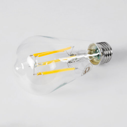 GloboStar® 99090 Λάμπα LED Long Filament E27 ST64 Αχλάδι 7W 1470lm 360° AC 220-240V IP20 Φ6.4 x Υ14.5cm Θερμό Λευκό 2700K με Διάφανο Γυαλί – Pro Series 210lm/W – A Ενεργειακή Κλάση – 3 Χρόνια Εγγύηση